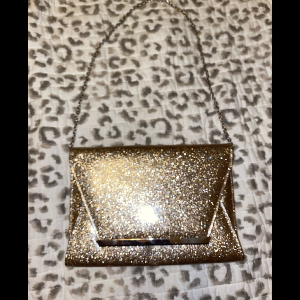 Kelly & Katie gold glitter clutch